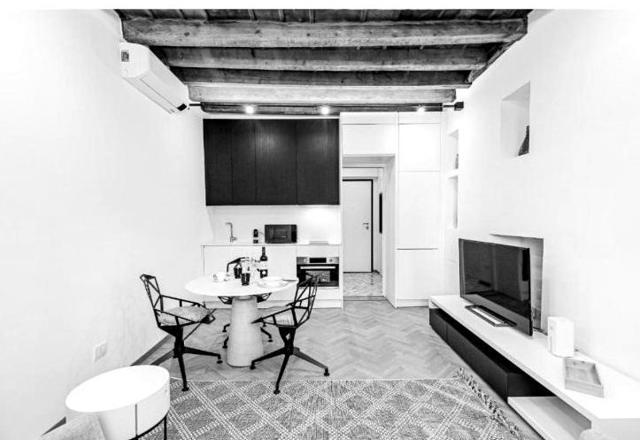 Casa Asnago e Vender — soggiorno con travi a vista